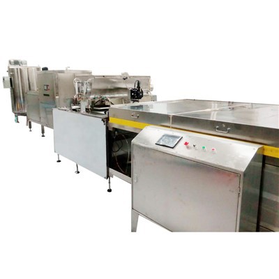 Stroj na výrobu čokoládových kvapiek